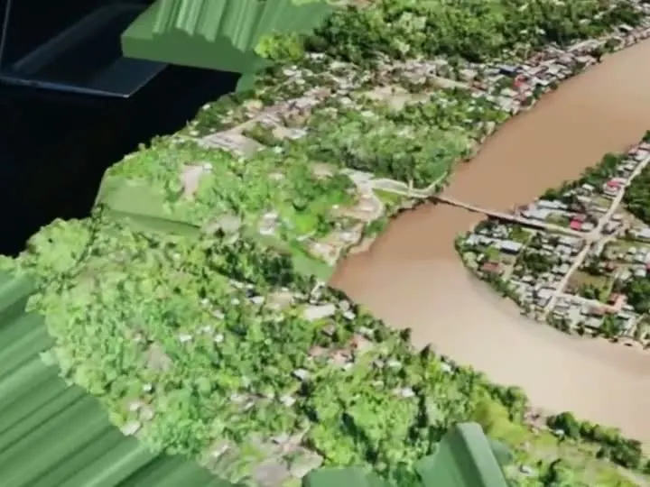 Maqueta 3D de una ciudad junto a un río vista con HoloLens 2